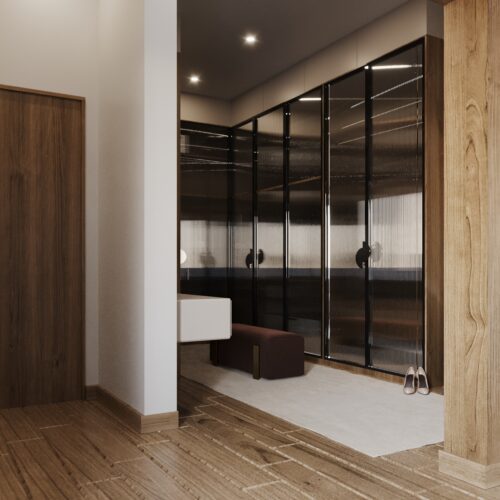 Modern living room featuring a minimalist design with a comfortable sofa, elegant decor, and neutral tones